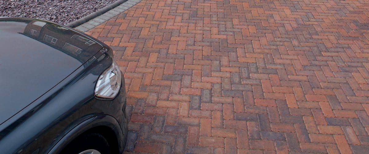 permeable driveway installers showing block paving and car on driveway
